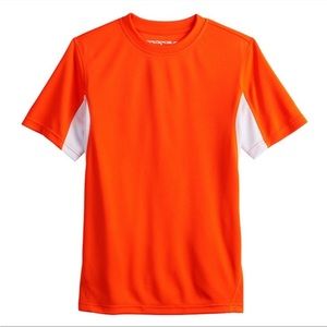 Orange and white short sleeve ZEROXPOSUR rash guard.